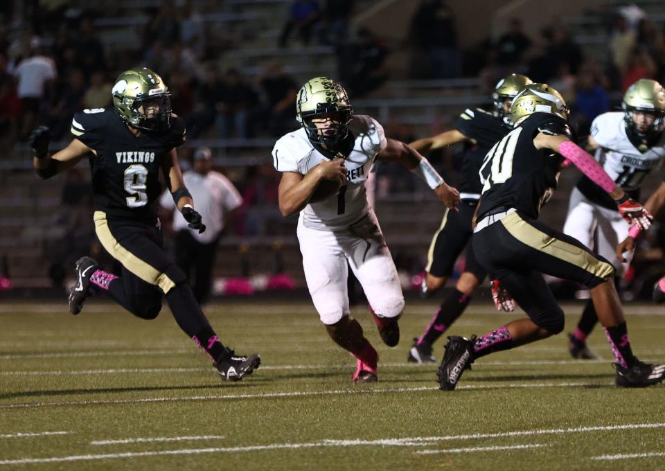 Crockett quarterback Cameron Dickey is one of two Austin-area athletes who have topped 1,000 yards rushing so far this season.