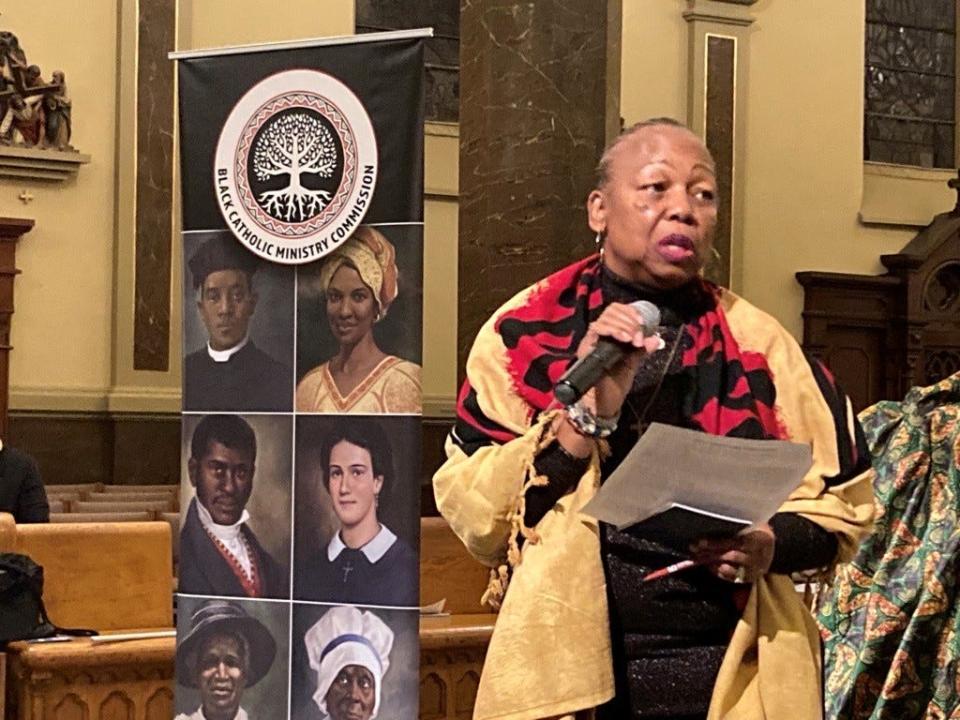 Mary Words, chair of the Black Catholic Ministry Commission, addresses parishioners at a Nov. 17th program recognizing the lives of six Black Catholics who are being considered for canonization or sainthood by Pope Francis.