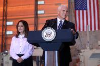 U.S. Vice President Mike Pence, next to his wife Karen, delivers remarks to U.S. troops at Al Asad Air Base