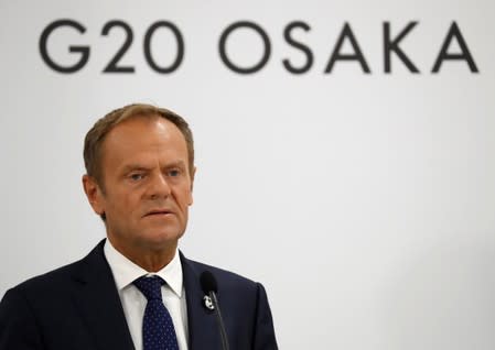 European Council President Donald Tusk attends a joint news conference with EU Commission President Jean-Claude Juncker at the G20 leaders summit in Osaka