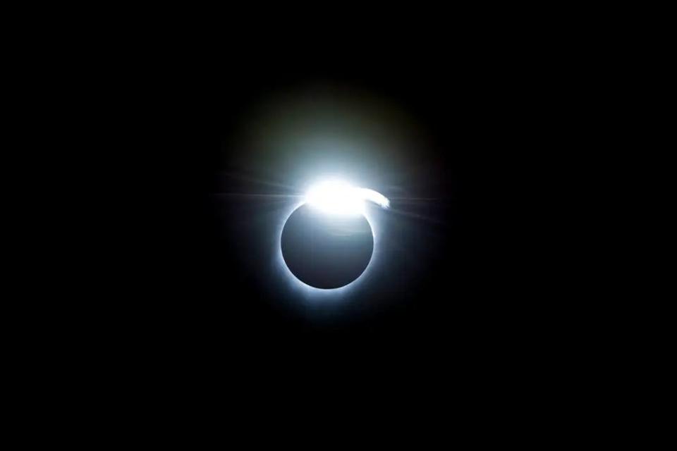 The diamond-ring effect occurred at the beginning and end of totality during a total solar eclipse. As the last bits of sunlight pass through the valleys on the moon’s limb, and the faint corona around the sun is just becoming visible, it looks like a ring with glittering diamonds on it.<br>Credit: NASA/Carla Thomas