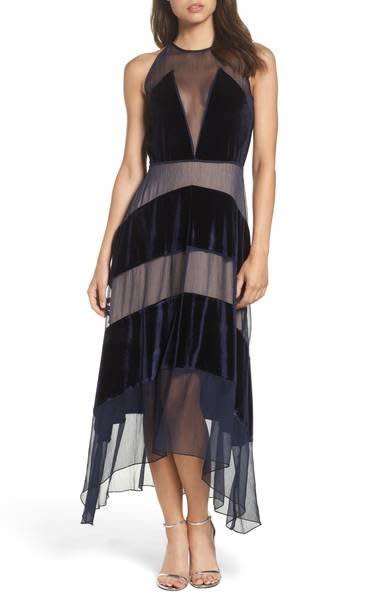 We love how <a href="https://shop.nordstrom.com/s/foxiedox-velvet-stripe-midi-dress/4738269?origin=keywordsearch-personalizedsort&amp;fashioncolor=ROYAL%20BLUE" target="_blank">this swingy midi-dress</a>&nbsp;features a plunging sheer neckline that is subtle but still so sexy.