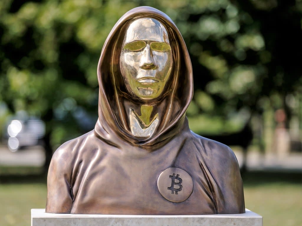 A statue of Satoshi Nakamoto, a presumed pseudonym used by the inventor of Bitcoin, is displayed in Graphisoft Park on 22 September, 2021 in Budapest, Hungary (Getty Images)
