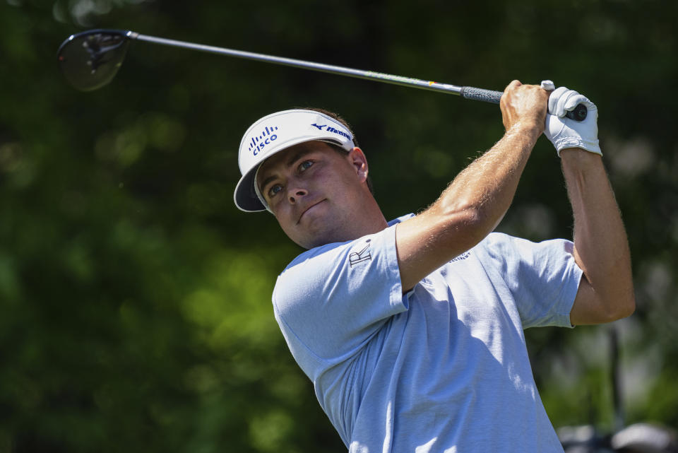 Keith Mitchell tees off on the seventh hole during the fourth round of the Wells Fargo Championship golf tournament at Quail Hollow on Sunday, May 9, 2021, in Charlotte, N.C. (AP Photo/Jacob Kupferman)