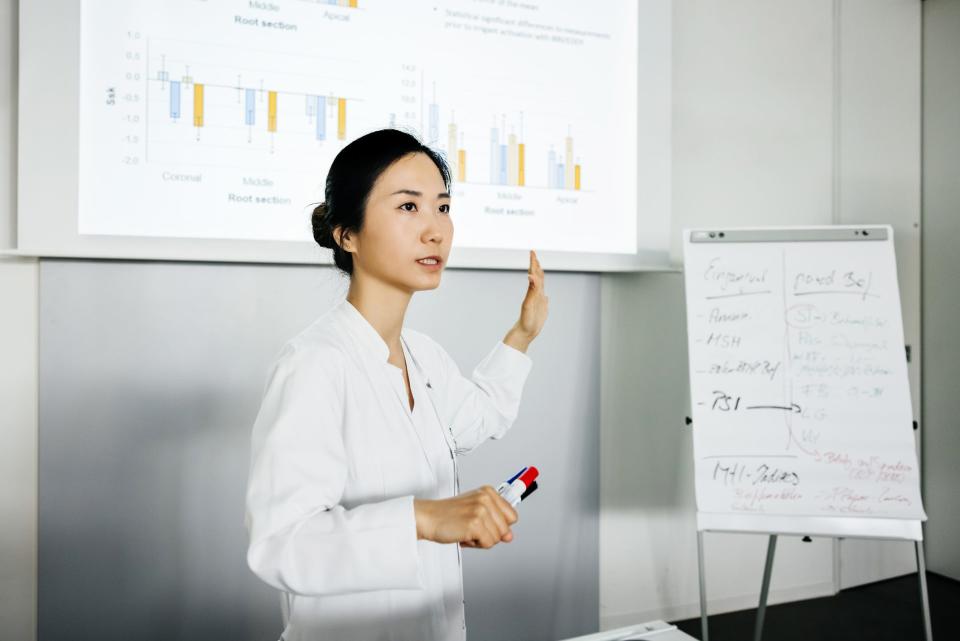 A woman leading a presentation