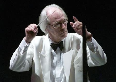 Sir George Martin conducts the Hollywood Bowl Orchestra with a program of music by the Beatles June 25 at the Hollywood Bowl in Hollywood. Martin, record producer for the Beatles, featured over twenty of the Beatles legendary songs during the opening night concert.