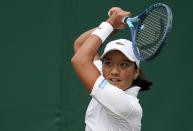 France's Harmony Tan returns to Britain's Katie Boulter during their women's third round singles match on day six of the Wimbledon tennis championships in London, Saturday, July 2, 2022. (AP Photo/Alberto Pezzali)
