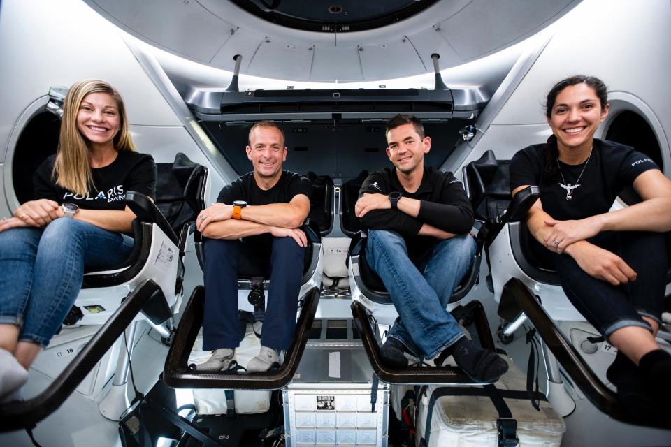 From left, Anna Menon, Scott Poteet, Jared Isaacman and Sarah Gillis make up the Polaris Dawn crew. They're seen here at SpaceX headquarters. Polaris Dawn will spend up to five days in the highest earth orbit attempted, during which the crew will conduct a commercial spacewalk and other studies.