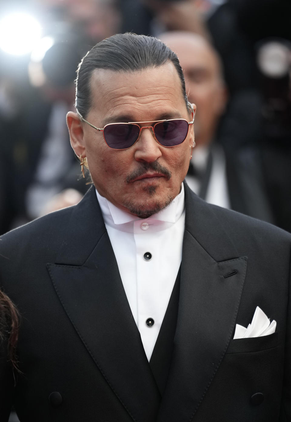 Johnny Depp poses for photographers upon arrival at the opening ceremony and the premiere of the film 'Jeanne du Barry' at the 76th international film festival, Cannes, southern France, Tuesday, May 16, 2023. (Photo by Scott Garfitt/Invision/AP)