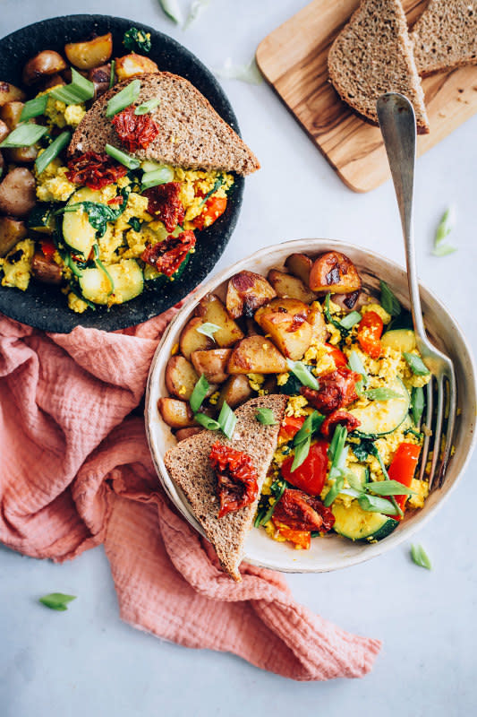 <p>Hello Veggie</p><p>These hearty tofu scramble bowls with red potatoes are perfect for meal prep - and super high in protein too!</p><p><strong>Get the recipe: <a href="https://helloveggie.co/tofu-scramble-bowls/" rel="nofollow noopener" target="_blank" data-ylk="slk:Tofu Scramble Bowls with Red Potatoes;elm:context_link;itc:0;sec:content-canvas" class="link ">Tofu Scramble Bowls with Red Potatoes</a></strong></p>