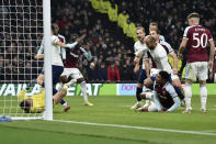 Tottenham's Lucas Moura, second right, scores his side's second goal during the English League Cup quarterfinal soccer match between Tottenham Hotspur and West Ham United at the Tottenham Hotspur Stadium in London, Wednesday, Dec. 22, 2021. (AP Photo/Rui Vieira)