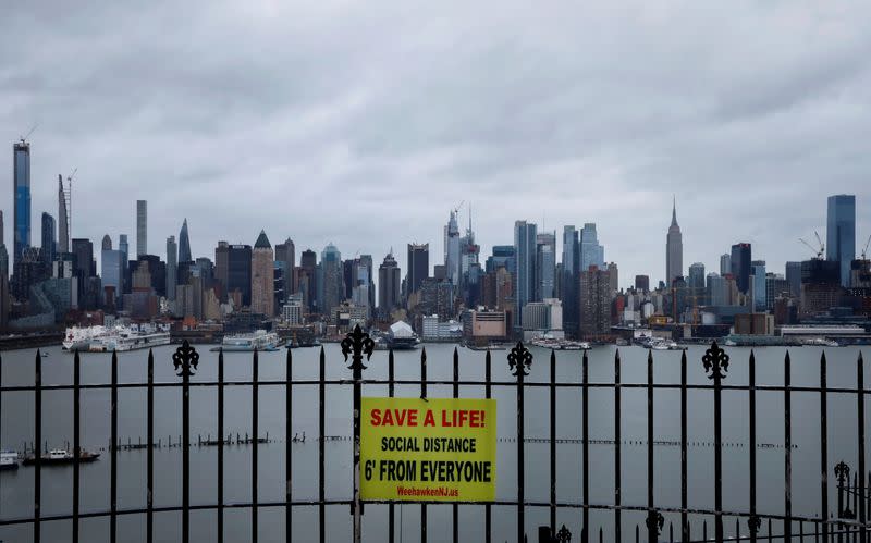 The New York City skyline of Manhattan during outbreak of the coronavirus disease (COVID-19), from Weehawken