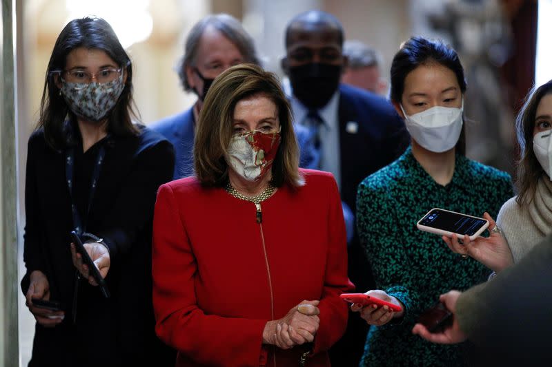 FILE PHOTO: Speaker of the House Pelosi speaks to reporters on Capitol Hill in Washington