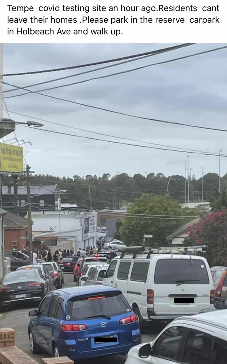 Cars blocking the streets near Tempe Covid testing site.