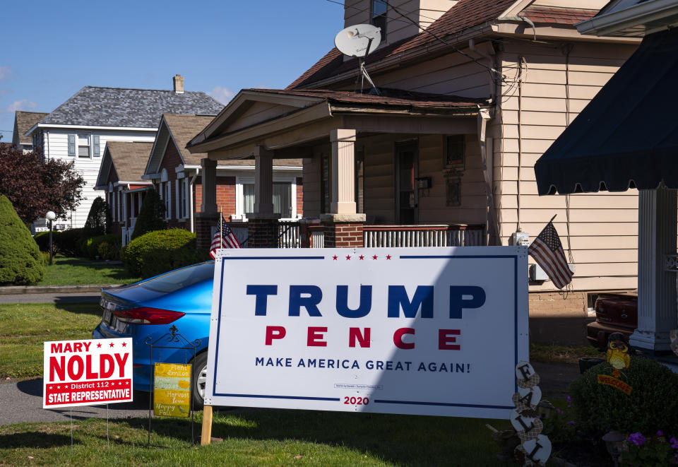 THROOP, PENNSYLVANIA - OCTOBER 9: A President Donald Trump presidential campaign sign is staked on the front lawn of a residential house October 9, 2020 in Throop, Pennsylvania. The sign is located in the politically strategic northeast Lackawanna County, near Joe Biden's hometown of Scranton, PA. (Photo by Robert Nickelsberg/Getty Images)