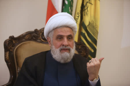 Lebanon's Hezbollah deputy leader Sheikh Naim Qassem gestures as he speaks during an interview with Reuters in Beirut, Lebanon March 15, 2018. REUTERS/Aziz Taher