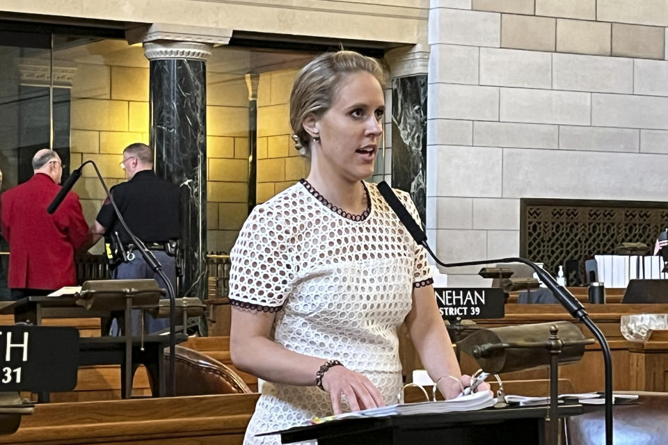 FILE - Nebraska Sen. Julie Slama speaks, Tuesday, May 30, 2023, at the Nebraska Capitol in Lincoln, Neb. During televised legislative debate, Slama, who at 27 has become one of the body's most conservative members, hobbled in from a hospital, two other lawmakers keeping her vertical, to cast the final vote needed to pass an abortion-transgender bill. (AP Photo/Margery Beck, File)