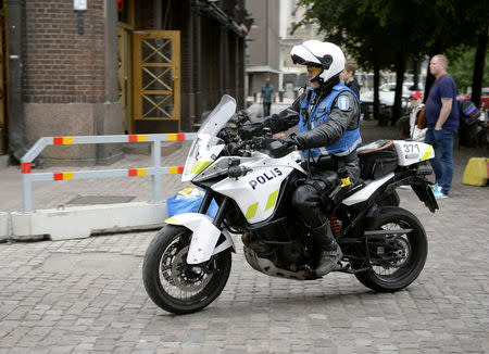 Finnish police patrols on motorbike after stabbings in Turku, in Central Helsinki, Finland August 18, 2017. LEHTIKUVA/Linda Manner via REUTERS