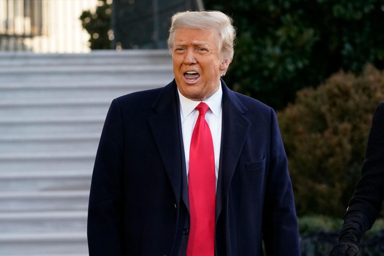 Mandatory Credit: Photo by Alex Brandon/AP/Shutterstock (11718145z)President Donald Trump speaks with reporters as he walks to board Marine One on the South Lawn of the White House, in Washington.