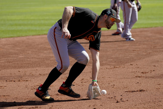 Vaccine side effects put Giants' Evan Longoria out of lineup for