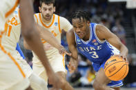 Duke guard Jeremy Roach (3) drives around the Tennessee defense during the first half of a second-round college basketball game in the NCAA Tournament Saturday, March 18, 2023, in Orlando, Fla. (AP Photo/Chris O'Meara)