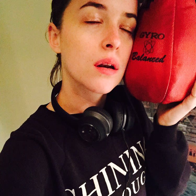 Well this is certainly a welcome surprise! The usually private Dakota Johnson is now giving her fans more intimate glimpses of her personal life, officially joining Instagram on Saturday. The 25-year-old <em>Fifty Shades of Grey</em> star's very first picture is one of her getting her exercise on, going makeup-free and posing with a red punching bag and headphones. "Cuddling," she joked. <strong>PHOTOS: 16 Times We Related to Dakota Johnson Too Well</strong> She also showed off her taste for old school music on Wednesday, sharing a picture of scattered records of Patti Smith, Miles Davis, and Bob Dylan to name a few. "My friends," she wrote. So if you had any doubts that Dakota's a cool girl, you can put that to rest right now. The daughter of Melanie Griffith and Don Johnson has already racked up more than 98,000 followers as of Thursday, but curiously, she's not following anybody back. She did, however, get a warm welcome from celebrity makeup artist Pati Dubroff, who shared these shots of Dakota puckering up for the camera. "Welcome to Instagram @dakotajohnson FINALLY!!!" Dubroff excitedly wrote. Our thoughts exactly. <strong>NEWS: The Iconic 'Fifty Shades of Grey' Scene That Didn't Make the Cut</strong> Check out the video below to see an adorable flashback video of Dakota at the 2000 Academy Awards, when the then 10-year-old charmed ET on the red carpet while accompanying her mother Melanie, and Melanie's then-husband, actor Antonio Banderas.