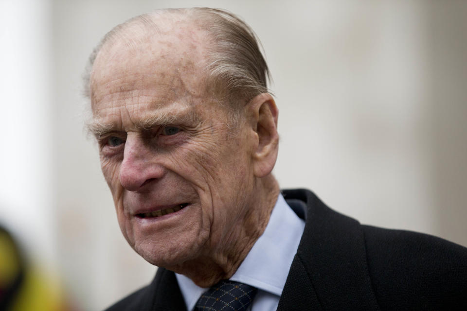Britain's Prince Philip, the husband of Britain's Queen Elizabeth II, walks to a waiting car as he leaves after the Commonwealth Day Observance at Westminster Abbey in London, Monday, March 11, 2013. Taking place annually on the second Monday in March, the Commonwealth Day Observance has a different theme every year, with the 2013 focus on ‘Opportunity through Enterprise.’ Britain's Queen Elizabeth II, who is the head of the Commonwealth, was due to attend the event, but cancelled as she continues her recovery after a brief illness. (AP Photo/Matt Dunham-Pool)