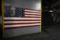 155 mm M795 artillery projectiles are stacked at the Scranton Army Ammunition Plant, Tuesday, Aug. 27, 2024, in Scranton, Pa. (AP Photo/Matt Slocum)