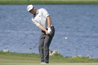 Talor Gooch chips a shot to the sixth green during the third round of the Arnold Palmer Invitational golf tournament Saturday, March 5, 2022, in Orlando, Fla. (AP Photo/John Raoux)