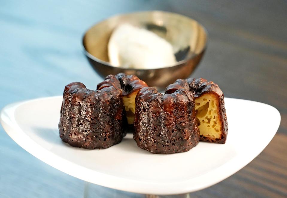 Pastry chef Ariel Welch, of Ardent, created signature desserts for 1033, including a rich canele with salted ice cream.