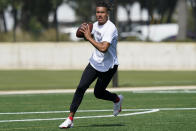 Texas A&M quarterback Kellen Mond gets ready to pass the ball during an NFL football mini combine organized by House of Athlete, Friday, March 5, 2021, in Fort Lauderdale, Fla. (AP Photo/Marta Lavandier)