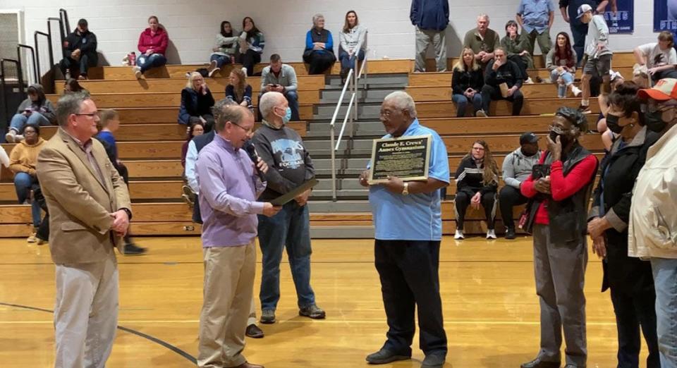 Claude Crews was recently honored by the Swansboro community by having the middle school's gym annex named after him. Crews has helped serve area athletics for many years. 