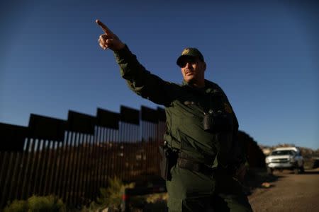 U.S. Border Patrol Agent David Ruiz patrols the U.S. border with Mexico in Nogales, Arizona, U.S., January 31, 2017. REUTERS/Lucy Nicholson
