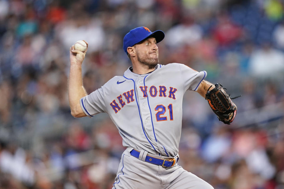 New York Mets starting pitcher Max Scherzer throws during the second inning of a baseball game against the Washington Nationals at Nationals Park, Monday, Aug. 1, 2022, in Washington. (AP Photo/Alex Brandon)