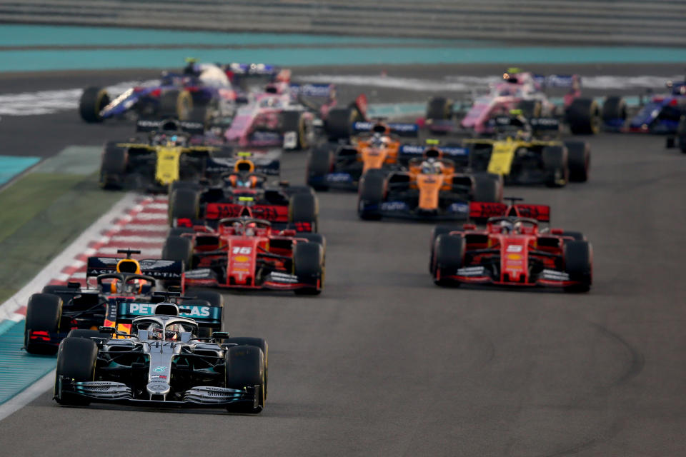 ABU DHABI, UNITED ARAB EMIRATES - DECEMBER 01: Lewis Hamilton of Great Britain driving the (44) Mercedes AMG Petronas F1 Team Mercedes W10 leads the field at the start during the F1 Grand Prix of Abu Dhabi at Yas Marina Circuit on December 01, 2019 in Abu Dhabi, United Arab Emirates. (Photo by Charles Coates/Getty Images)