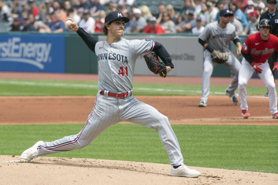 Minnesota Twins starting pitcher Joe Ryan delivers against the Cleveland Guardians during the first inning of a baseball game in Cleveland, Sunday, May 7, 2023. (AP Photo/Phil Long)