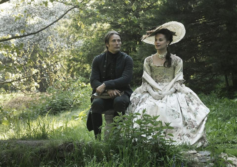 FILE - This publicity film image released by Magnolia Pictures shows Mads Mikkelsen, left, and Alicia Vikander in a scene from "A Royal Affair." The film was nominated for an Academy Award in the Foreign Language Film category. The 85th Academy Awards will air live on Sunday, Feb. 24, 2013 on ABC. (AP Photo/Magnolia Pictures, File)