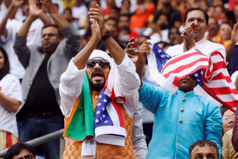 FILE PHOTO: Supporters react during a "Howdy, Modi" rally celebrating India's Prime Minister Narendra Modi at NRG Stadium in Houston, Texas