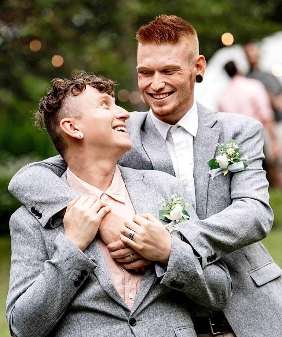 Alberto Glazier, 25, left and Jesse Glazier, 24, on their wedding day, July 24, 2021. The Erie couple have been foster parents for a little over a year.