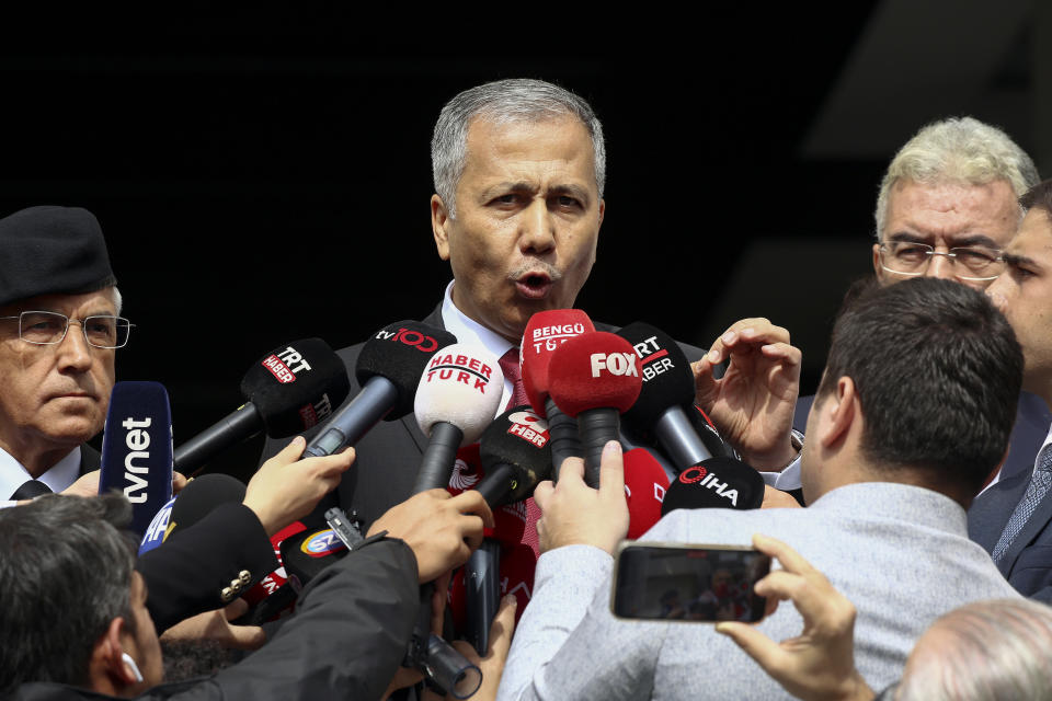 Turkish Interior Minister Ali Yerlikaya talks to journalists in Ankara, Sunday, Oct. 1, 2023. A suicide bomber detonated an explosive device in the heart of the Turkish capital, Ankara, on Sunday, hours before parliament was scheduled to reopen after a summer recess. A second assailant was killed in a shootout with police. (AP Photo/Ali Unal)