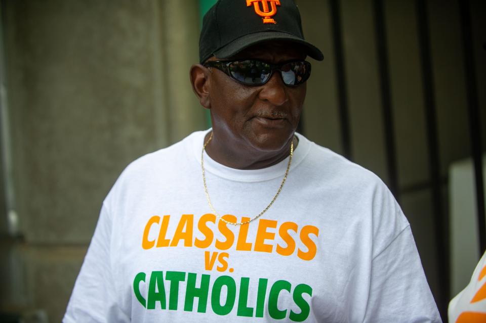 A Tennessee fan sports a "Classless vs. Catholics" T-shirt.