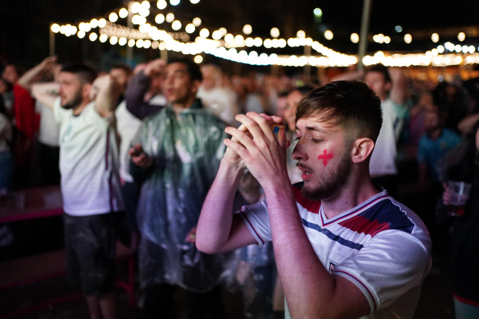 England fans at Luna Springs in Birmingham watching the penalty shoot out during the UEFA Euro 2020 Final between Italy and England. Picture date: Sunday July 11, 2021.