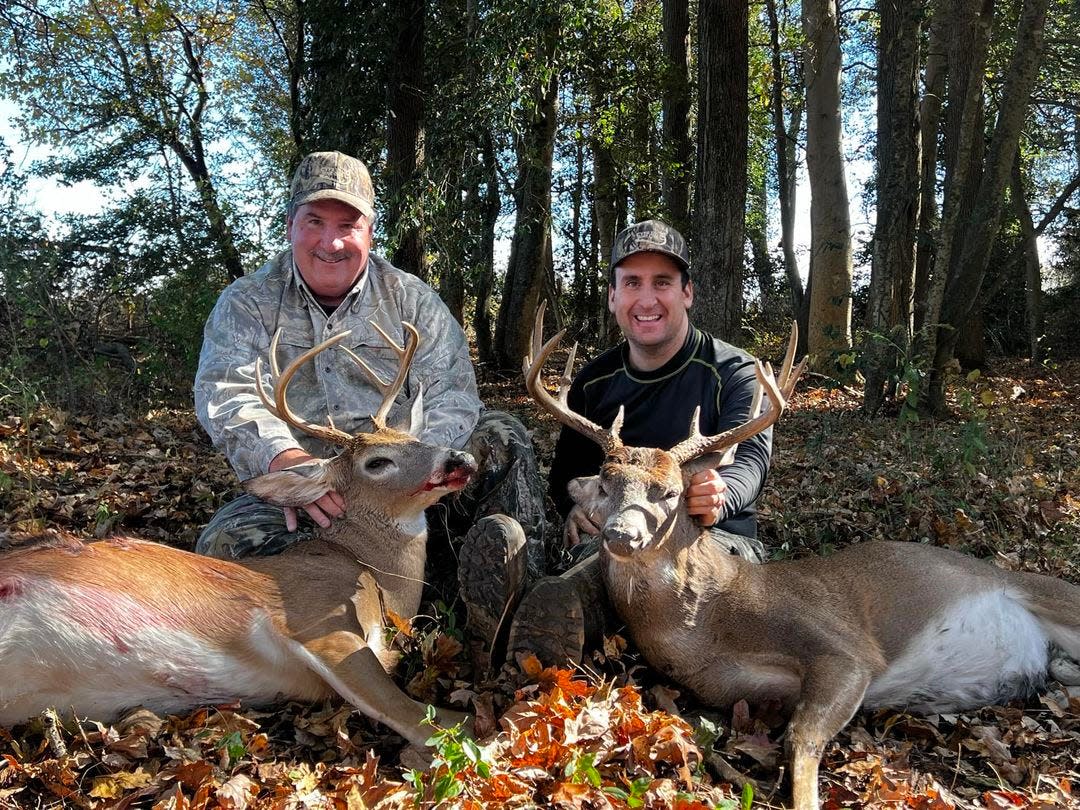 David "Dave" Slaybaugh Sr. and his son Parker pose with bucks they harvested in Surry in November 2023.