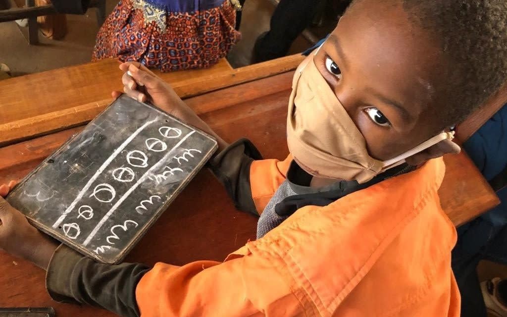 A child practises writing in a classroom in Kaya, Burkina Faso - Anouk Desgroseilliers / Education Cannot Wait