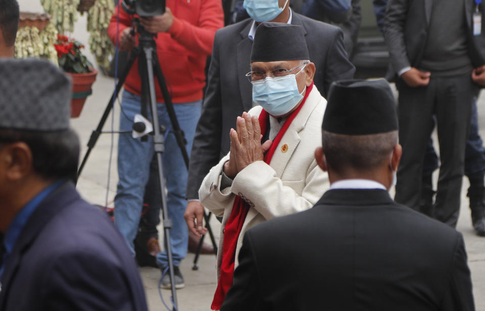 Nepalese Prime minister Khadga Prassad Oli arrives for the Parliament session in Kathmandu, Nepal, Sunday, March 7, 2021. Nepal’s Parliament reinstated by the nation's Supreme Court began session on Sunday that would likely determine the future of the prime minister and government. (AP Photo/Niranjan Shrestha)