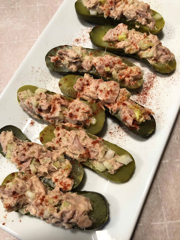 <p>Sula and Spice</p><p>A crunchy pickle filled with tuna salad! Genius!</p><p><strong>Get the recipe:</strong><a href="https://sulaandspice.com/tuna-salad-boats/" rel="nofollow noopener" target="_blank" data-ylk="slk:Tuna Salad Boats;elm:context_link;itc:0;sec:content-canvas" class="link "> <strong>Tuna Salad Boats</strong></a></p>