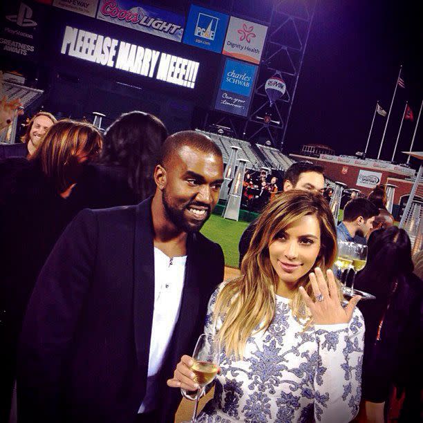 <p>Kanye West knocked it out of the park with his October 2013 proposal to Kim Kardashian, in which he rented out San Francisco's AT&T Park and got down on one knee in front of Kim's loved ones.</p> <p>A notable lesson from the rapper: don't be afraid to switch up the stock "Will you marry me?" with something more *you* — which, in Kanye's case, translated to "PLEEEASE MARRY MEEE!!!" flashing on a jumbotron.</p> <p>The pair, who share daughters North and Chicago as well as sons Saint and Psalm, <a href="https://people.com/tv/kim-kardashian-files-for-divorce-kanye-west/" rel="nofollow noopener" target="_blank" data-ylk="slk:went their separate ways in February 2021.;elm:context_link;itc:0;sec:content-canvas" class="link ">went their separate ways in February 2021.</a></p>