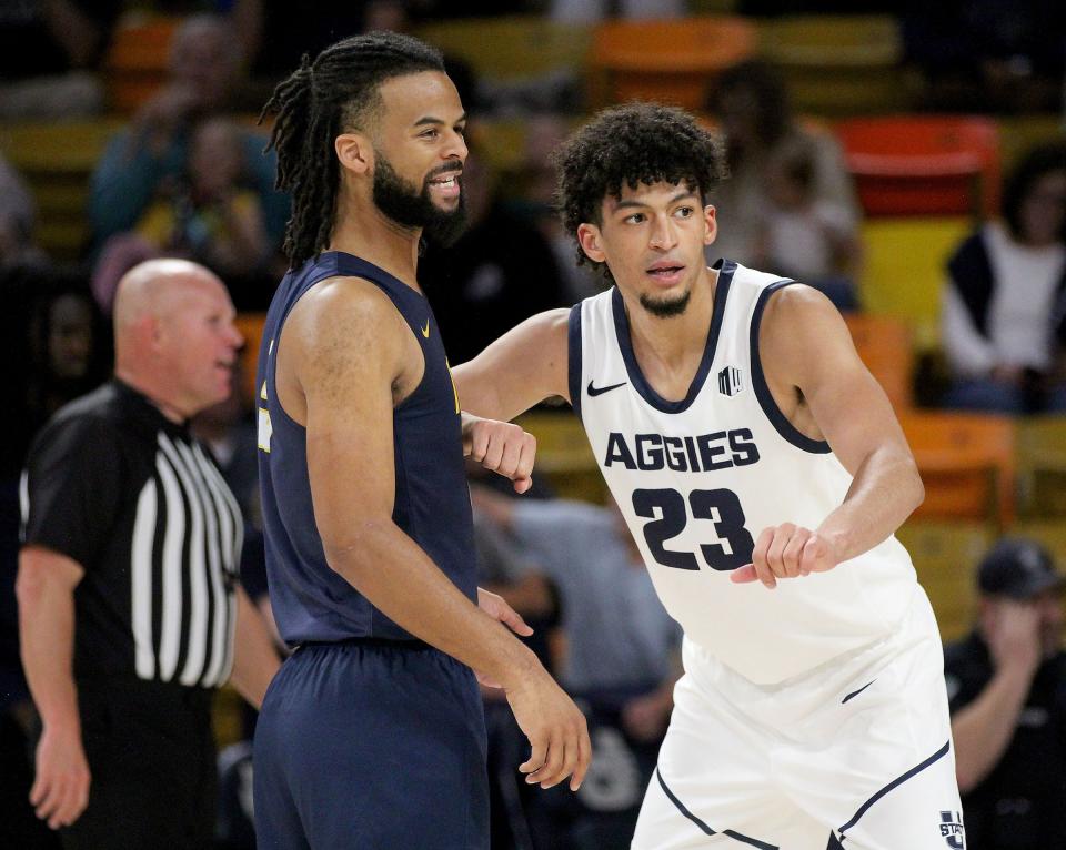 Utah State wing Max Agbonkpogo defends Montana State Billings guard Steven Richardson during the Aggies’ exhibition game on Nov. 3 at the Spectrum in Logan. | Jeff Hunter