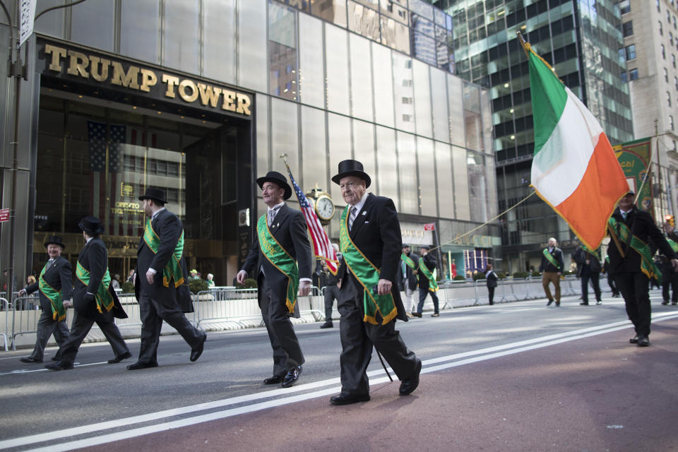 Participants march up Fifth Avenue past Trump tower during the St. Patrick's Day Parade, Saturday, March 16, 2019, in New York. (AP Photo/Mary Altaffer)