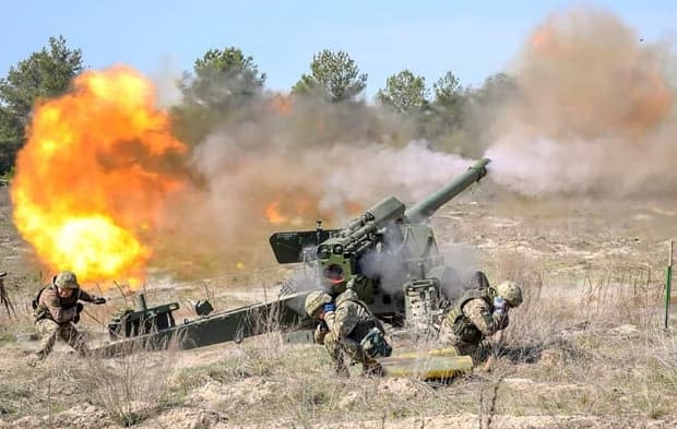 Ukrainian and Canadian servicemen do training exercises at Yavorivsky training ground close to Lviv, western Ukraine, Thursday, April 15, 2021. (Ukrainian Defense Ministry Press Office via AP - image credit)